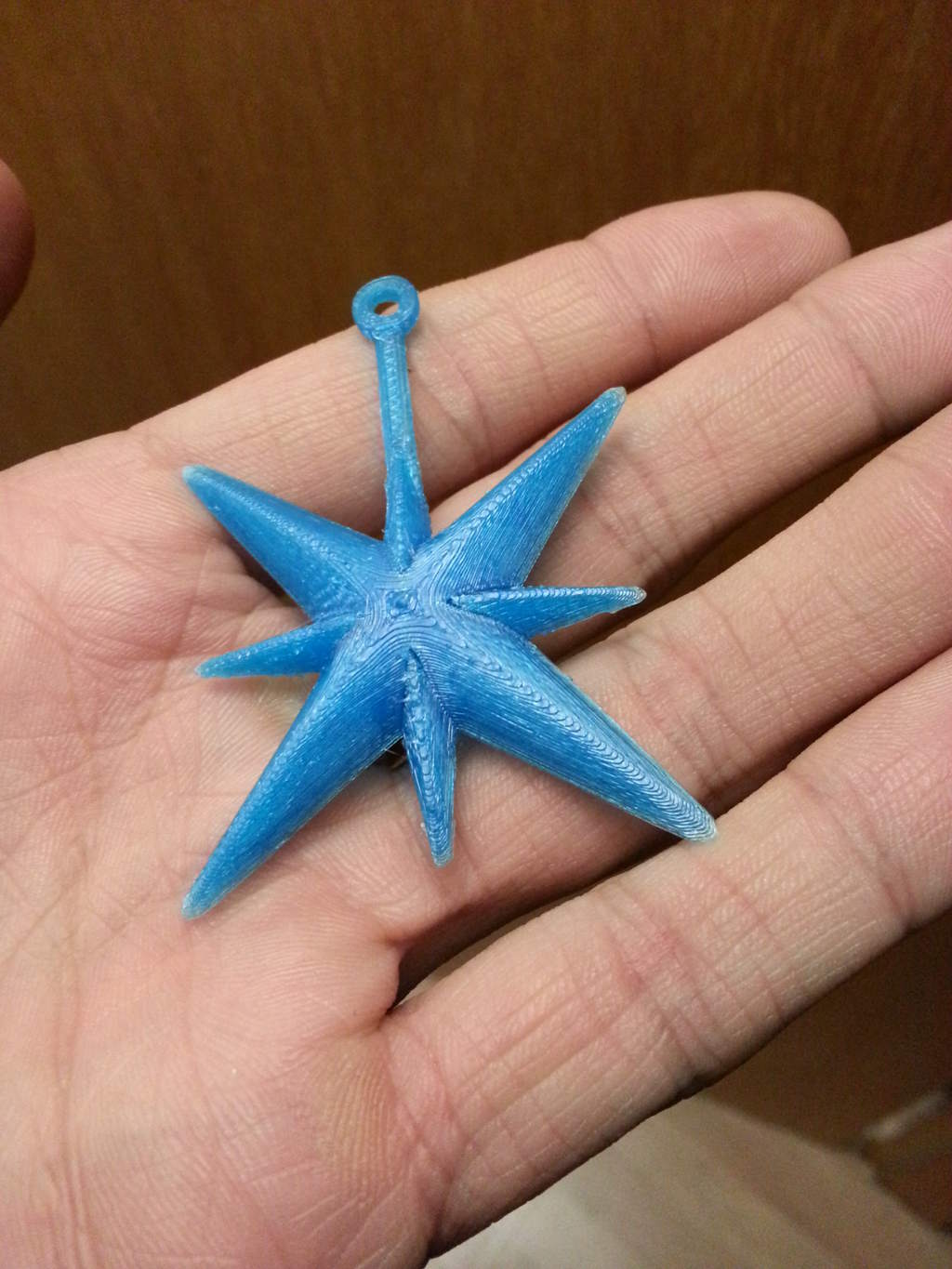 Xmas tree dekorations from the 3d printer: Blue stars to be put on the tree.
