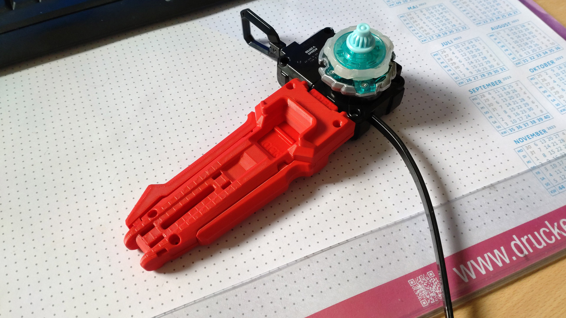 The beyblade starter assembled.